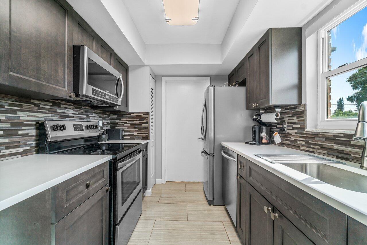 All ages, Available as annual rental, furnished or unfurnished, 2 bedroom and 2 bathroom on 1st floor corner with balcony and courtyard view. ALL updated! Floors, kitchen and baths, impact windows, all remodeled to high standards. Walk in closet. Located in east Boynton Beach with ,easy and quick access to downtown Boynton, downtown Delray and the beach. Water is included in the rent. No pets or commercial vehicles. Washer and dryer will be installed, in progress!