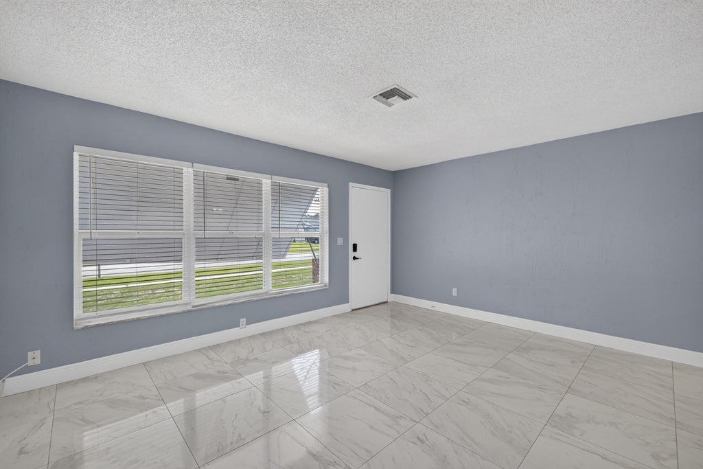 Photo of 732 SW RAVENSWOOD Lane, Port Saint Lucie, FL 34983 (MLS # B26073940)
