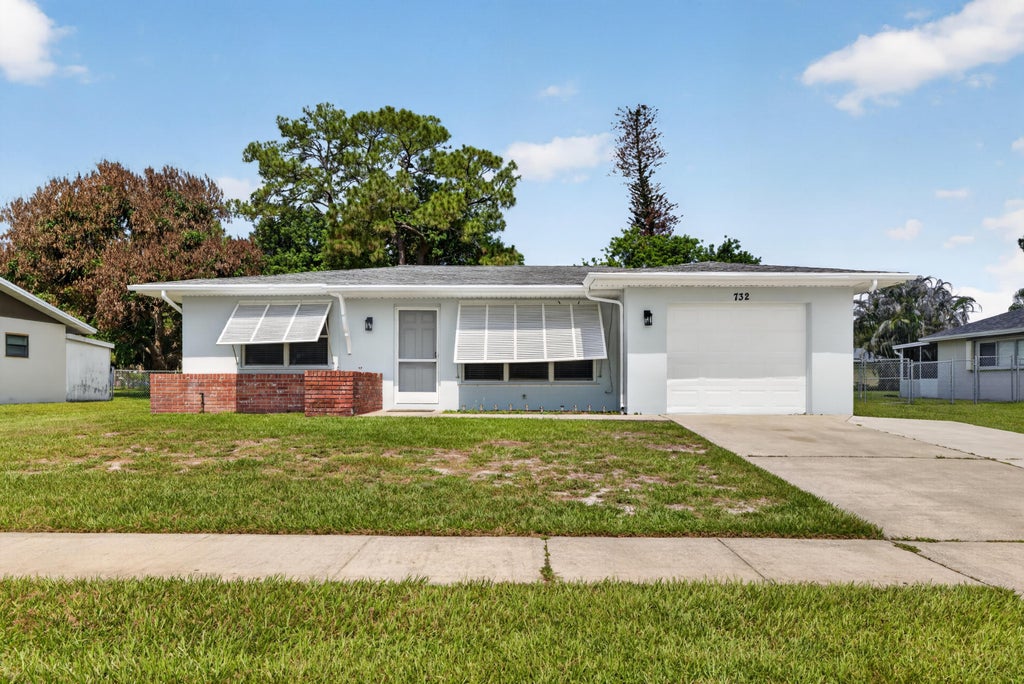 Photo of 732 SW RAVENSWOOD Lane, Port Saint Lucie, FL 34983 (MLS # B26073940)