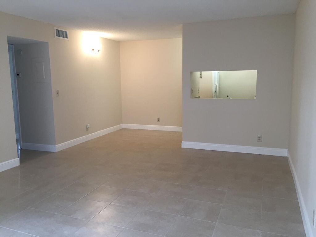 Photo of 826 Twin Lakes Drive #18-D, Coral Springs, FL 33071 (MLS # R10961825)