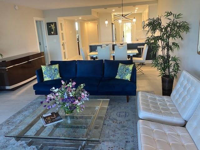 Fully furnished stunning annual rental with Electric, Cable, Internet, and water included. Small pet welcome with restrictions. Porcelain tile throughout, granite countertops with shaker cabinets and stainless appliances. 3/2 split floorplan with walk-in closet and custom cabinetry. All impact windows with beautiful lake views and plantation shutters. Great location, close to I-95, shopping, grocery stores, and banking.