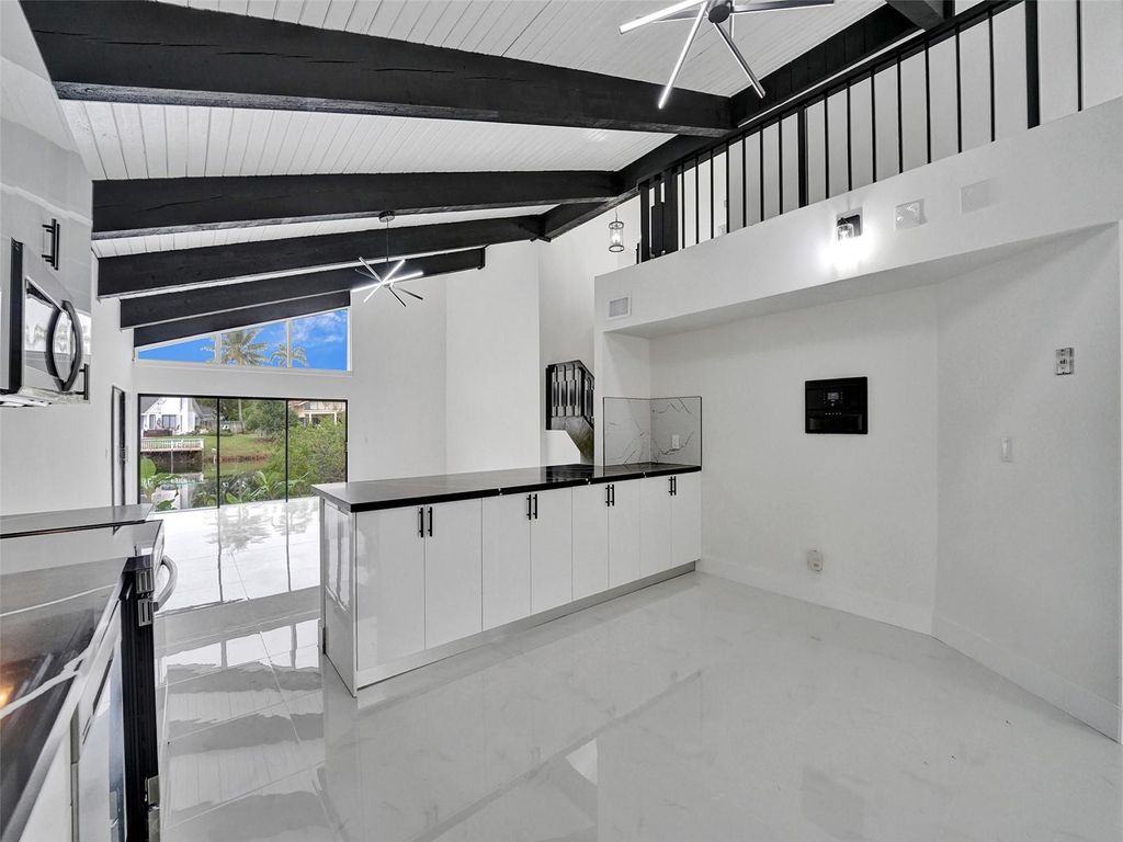 Photo of 641 Mockingbird Lane, Plantation, FL 33324 (MLS # F10449025)