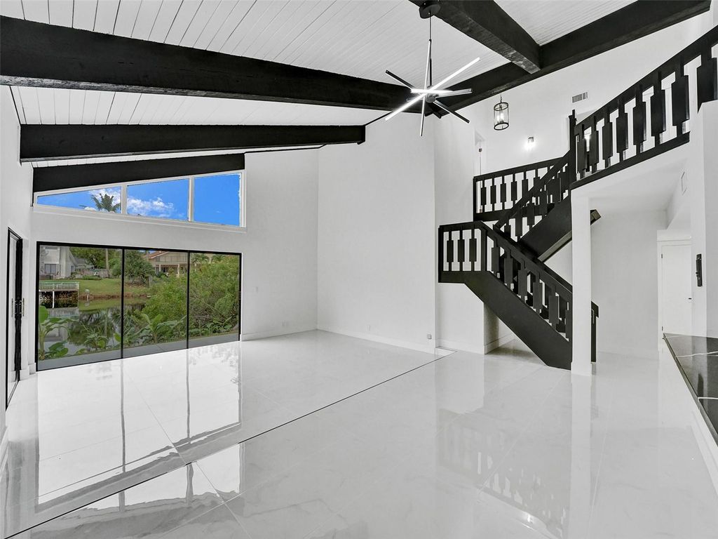 Photo of 641 Mockingbird Lane, Plantation, FL 33324 (MLS # F10449025)