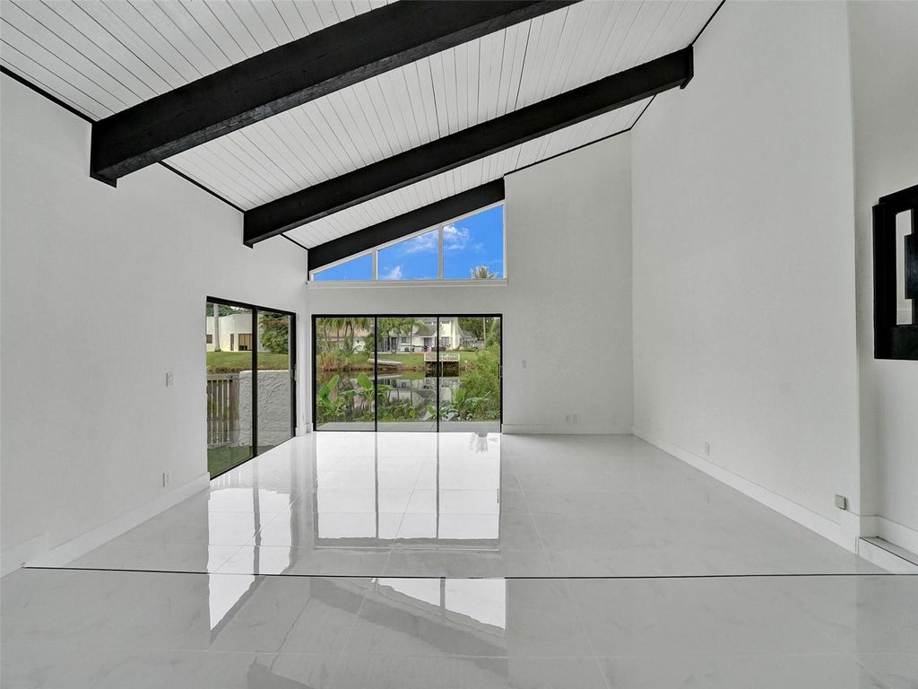 Photo of 641 Mockingbird Lane, Plantation, FL 33324 (MLS # F10449025)
