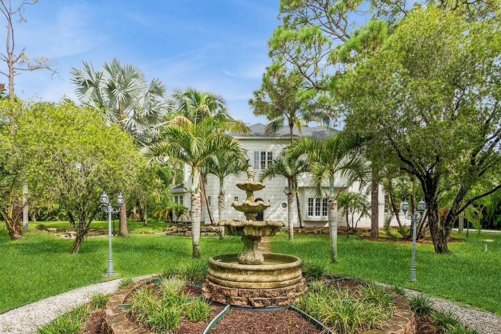 Photo of 8173 Banyan Boulevard, The Acreage, FL 33470 (MLS # R11011752)