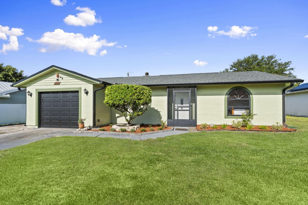 Photo of 4682 SW Pearl Street, Port Saint Lucie, FL 34953 (MLS # B26062077)