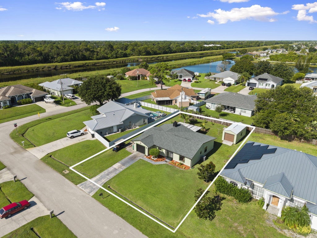 Photo of 4682 SW Pearl Street, Port Saint Lucie, FL 34953 (MLS # B26062077)