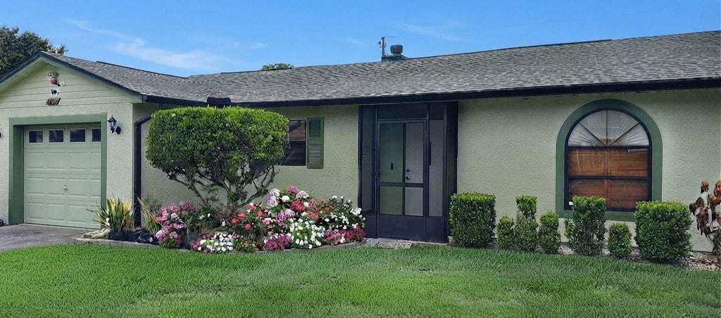 Photo of 4682 SW PEARL Street SW, Port Saint Lucie, FL 34953 (MLS # B26062077)