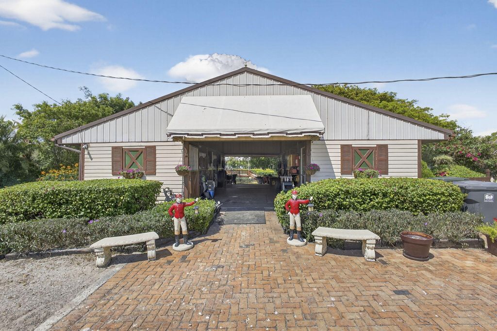 Photo of 739 Cindy Circle Lane, Wellington, FL 33414 (MLS # B26008843)