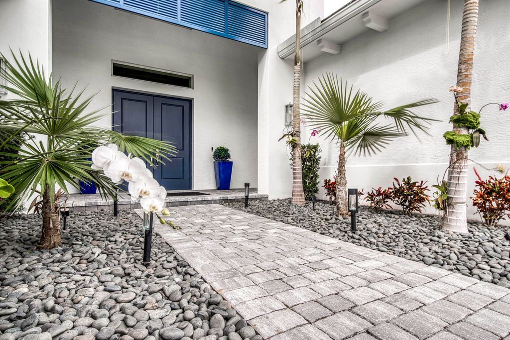 Photo of 9364 Coral Isles Circle, Palm Beach Gardens, FL 33412 (MLS # R11157396)