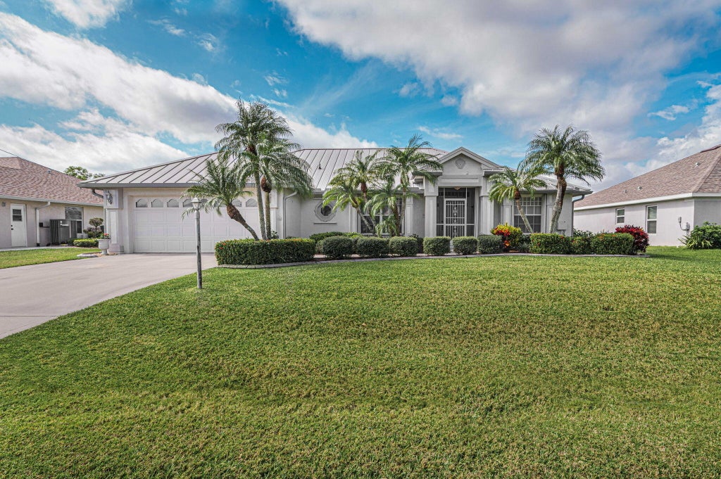 Photo of 6550 NW Pomona Court, Port Saint Lucie, FL 34983 (MLS # R11063897)