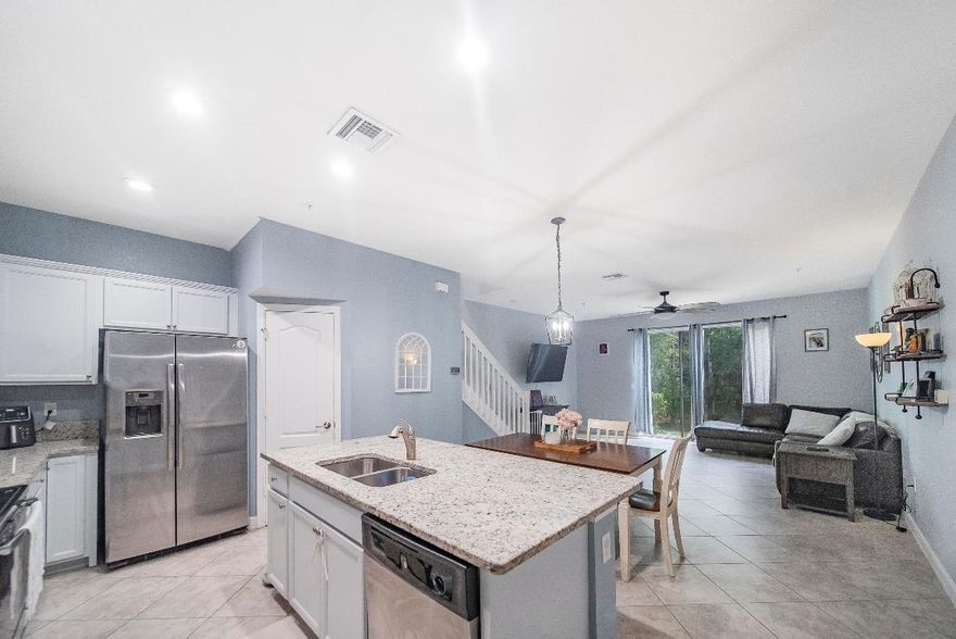 Beautiful 3-bedroom, 2.5-bath townhome with 1-car garage in desirable River Marina community of Stuart, FL! Built in 2017, this move-in ready home features open-plan living area that leads to a private backyard-perfect for relaxing or entertaining. Enjoy a modern kitchen with granite countertops and kitchen island, SS appliances, tile flooring on the main level, and luxury vinyl flooring upstairs. The spacious primary suite offers a walk-in closet and dual vanities. Set in a private location with a low HOA of only $148/month. River Marina offers a community pool and cabana, and is located in an A-rated school district. Enjoy an ideal location just 15 minutes to Treasure Coast beaches and top-rated golf courses and public boat ramp; 20 minutes to Jupiter and Palm Beach. Investor friendly.