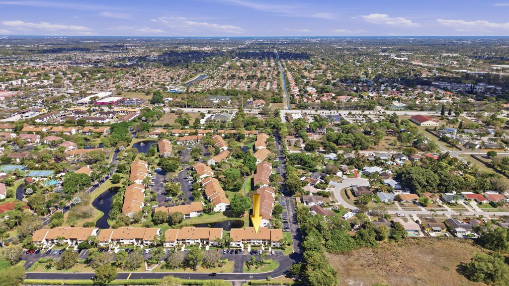 Photo of 3260 Perimeter Drive, Greenacres, FL 33467 (MLS # B26002404)