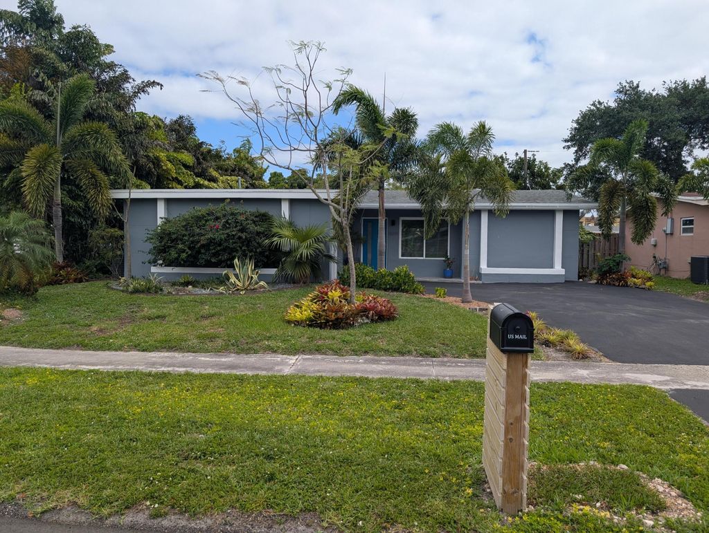 Photo of 8691 NW 28th Place, Sunrise, FL 33322 (MLS # B26016086)