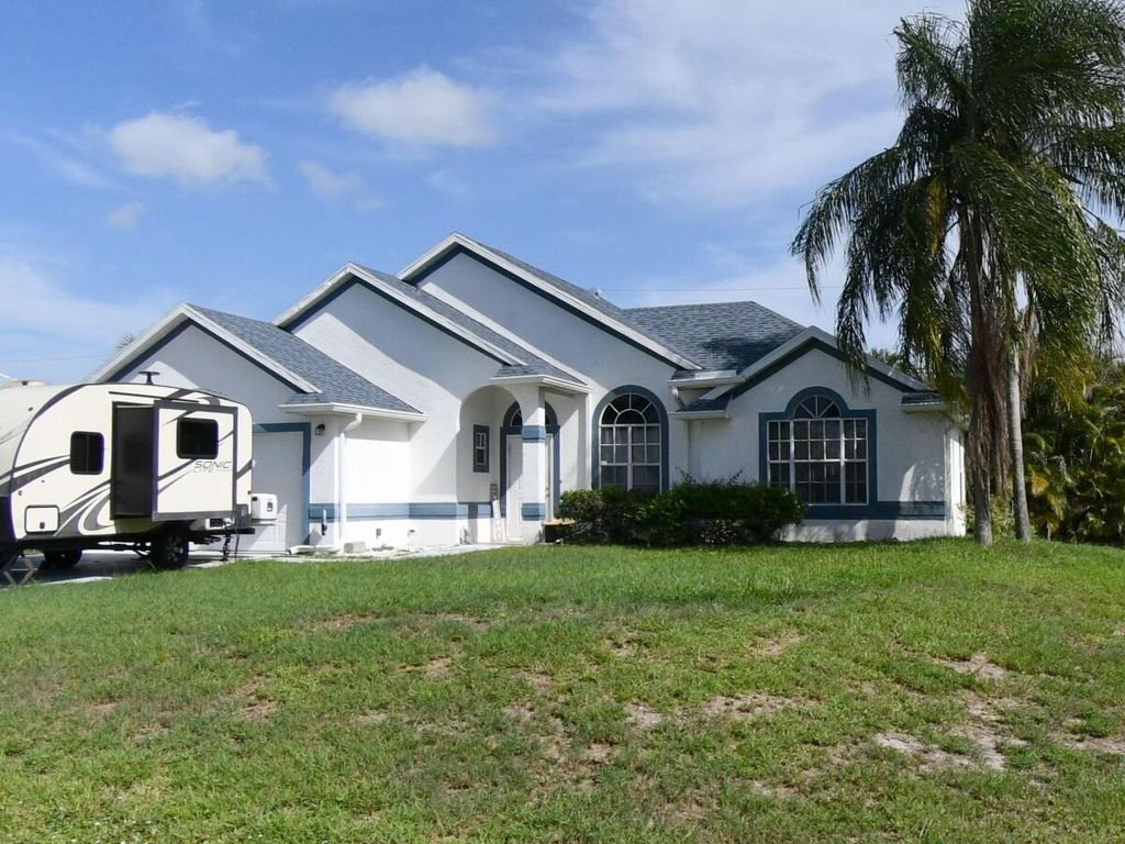 Photo of 962 SW Kappa Avenue SW, Port Saint Lucie, FL 34953 (MLS # R11166079)