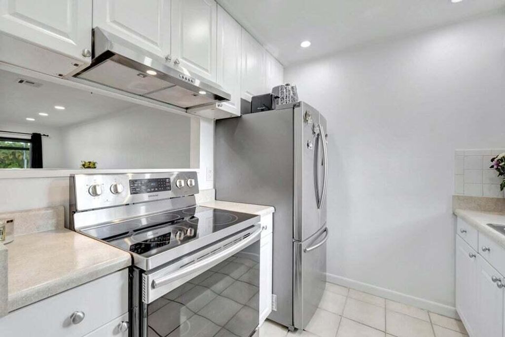 Photo of 5903 Channel Drive, Greenacres, FL 33463 (MLS # R11104075)