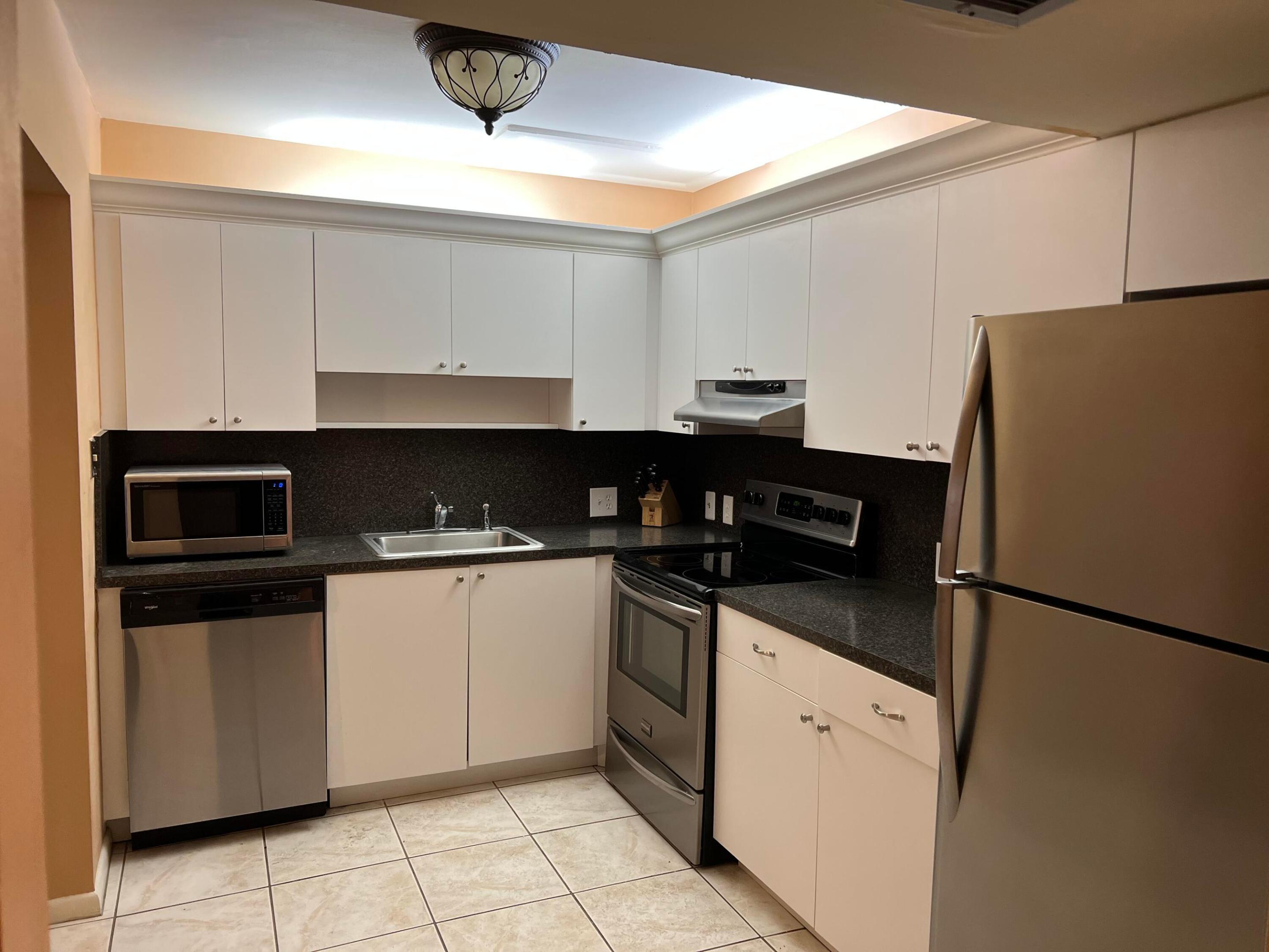 Photo 1 of 19 — 203 Suffolk E, Boca Raton, FL 33434