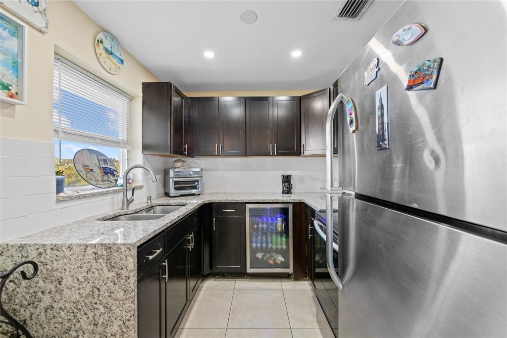 Photo of 941 Crystal Lake Drive #403, Deerfield Beach, FL 33064 (MLS # F10546779)