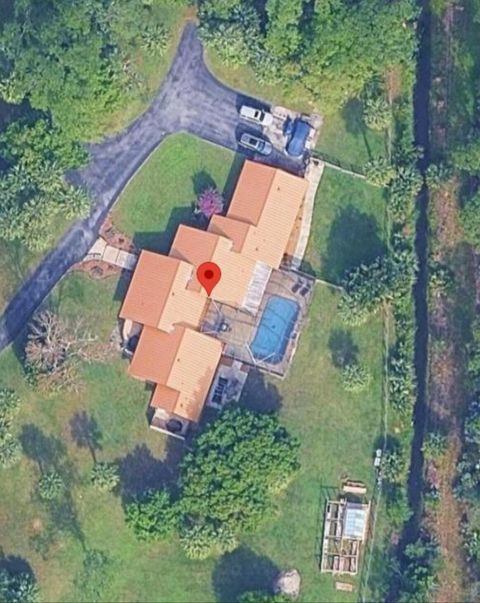 Photo of 11001 SW Hawkview Circle, Stuart, FL 34997 (MLS # B26023432)