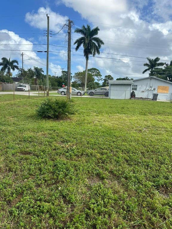 Photo of 1600 Breezy Lane, West Palm Beach, FL 33417 (MLS # F10509503)