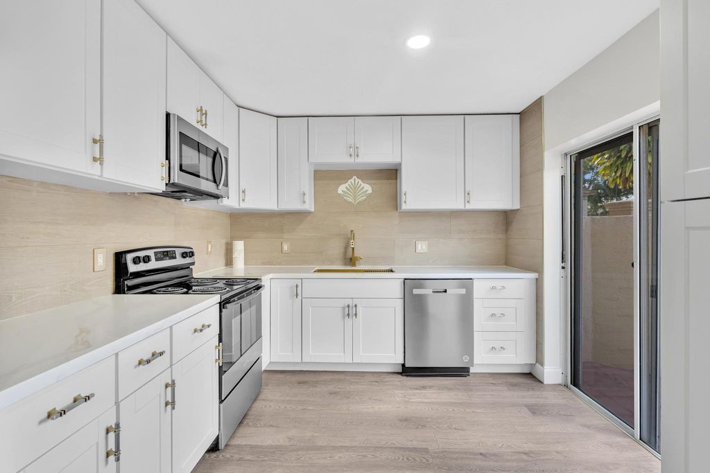 Photo of 6663 Via Regina, Boca Raton, FL 33433 (MLS # B26018086)