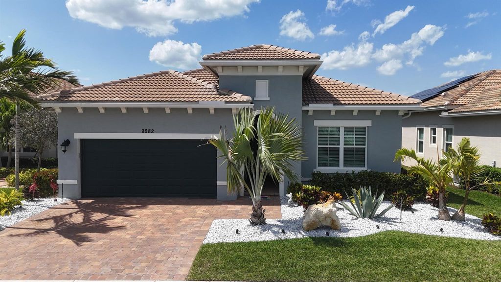 Photo of 9282 SW Miracoli Way, Port Saint Lucie, FL 34987 (MLS # R11142616)