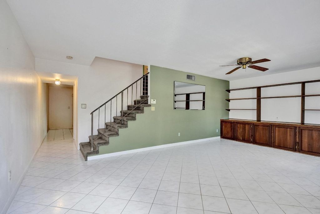 Photo of 42 Canterbury Lane, Tamarac, FL 33319 (MLS # F10529011)