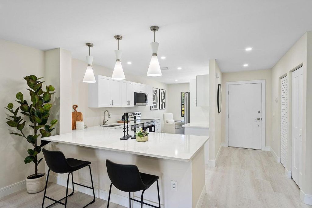 Photo of 20 Southport Lane #D, Boynton Beach, FL 33436 (MLS # R11155912)