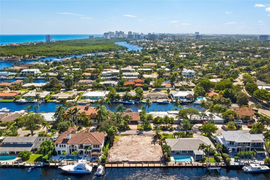 Discover the potential of this rare waterfront vacant lot, offering an exceptional opportunity to build a custom estate from the ground up. Situated on 100 ft of prime water frontage in the prestigious Coral Ridge golf course community, this property provides direct ocean access with no fixed bridges, ideal for boating enthusiasts and luxury waterfront living. Enjoy stunning water views, a private dock, and close proximity to the Intracoastal waterway, beaches, shopping, Bayview schools, parks, and fine dining. Endless possibilities await. Perfect for developers, investors, or buyers ready to create a personalized waterfront retreat.