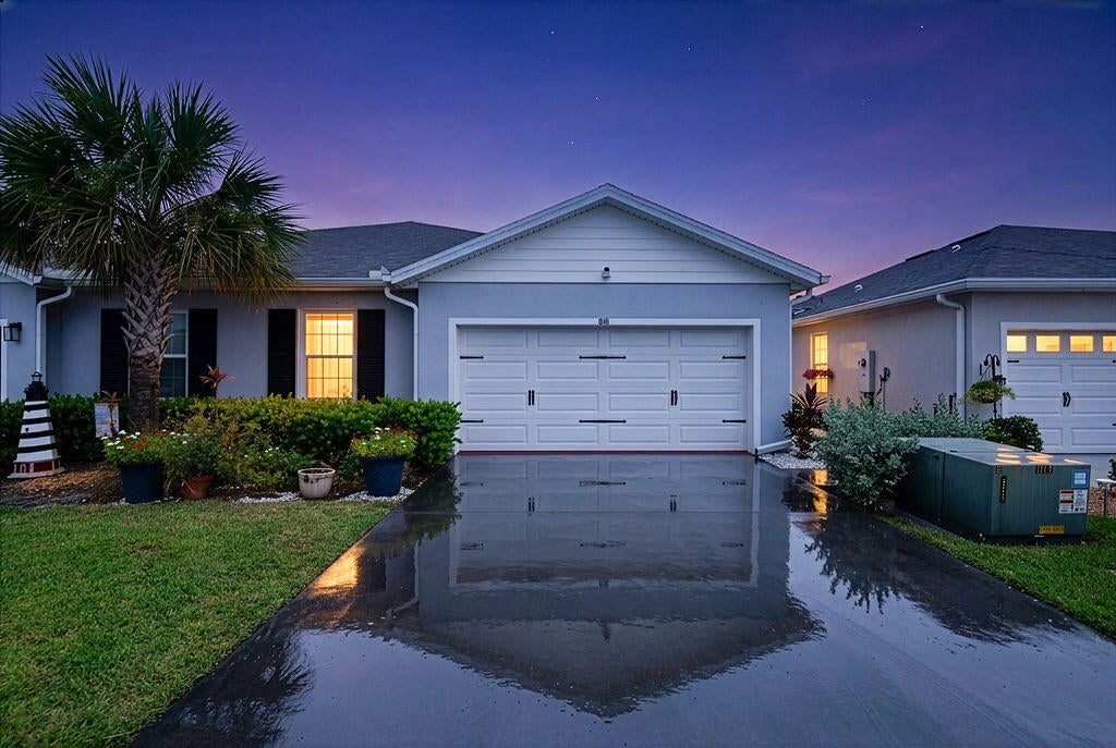 Photo of 818 Persimmon Place, Fort Pierce, FL 34981 (MLS # B26071535)