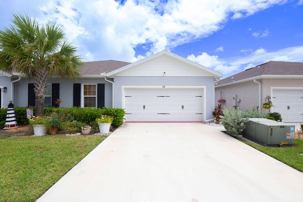 Photo of 818 Persimmon Place, Fort Pierce, FL 34981 (MLS # B26071535)