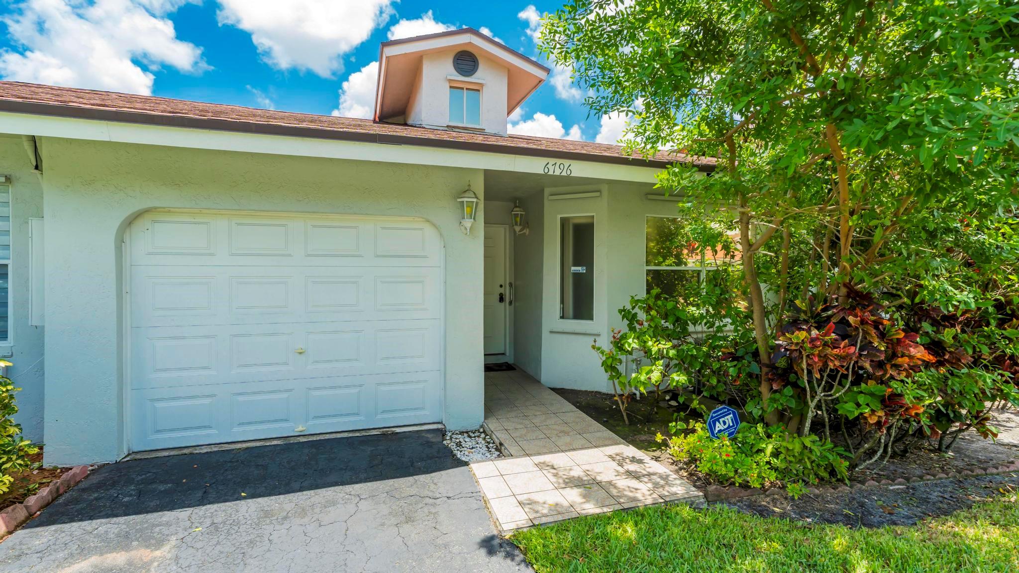Exceptional 2/2 Villa in the desirable area of Woodland Lakes. This charming home that features an excellent Open Concept Design with Vaulted ceilings creates a spacious living area, complemented by beautiful natural lighting, tile floors, Large Master suite with a nice size walk-In closet, granite counter tops in the kitchen and baths, hurricane shutters ,screened porch and 1 car garage. Coral Palms has host of amenities, including landscaping, community pool for those sunny Florida days, a well-equipped gym and a clubhouse for social gatherings and events. Schedule a showing today & make this Coral Palms villa your new home!