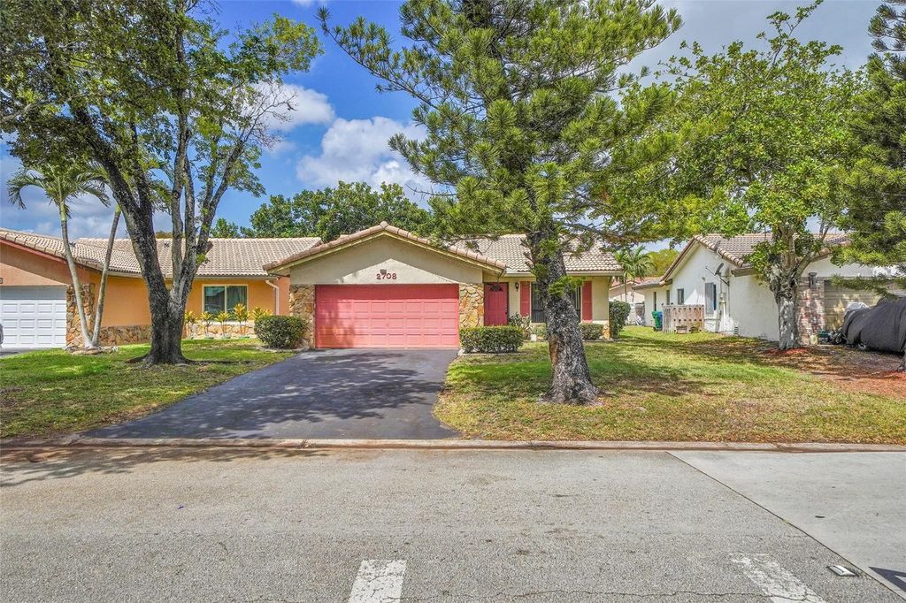 Photo of 2708 NW 91st Avenue, Coral Springs, FL 33065 (MLS # F10500385)