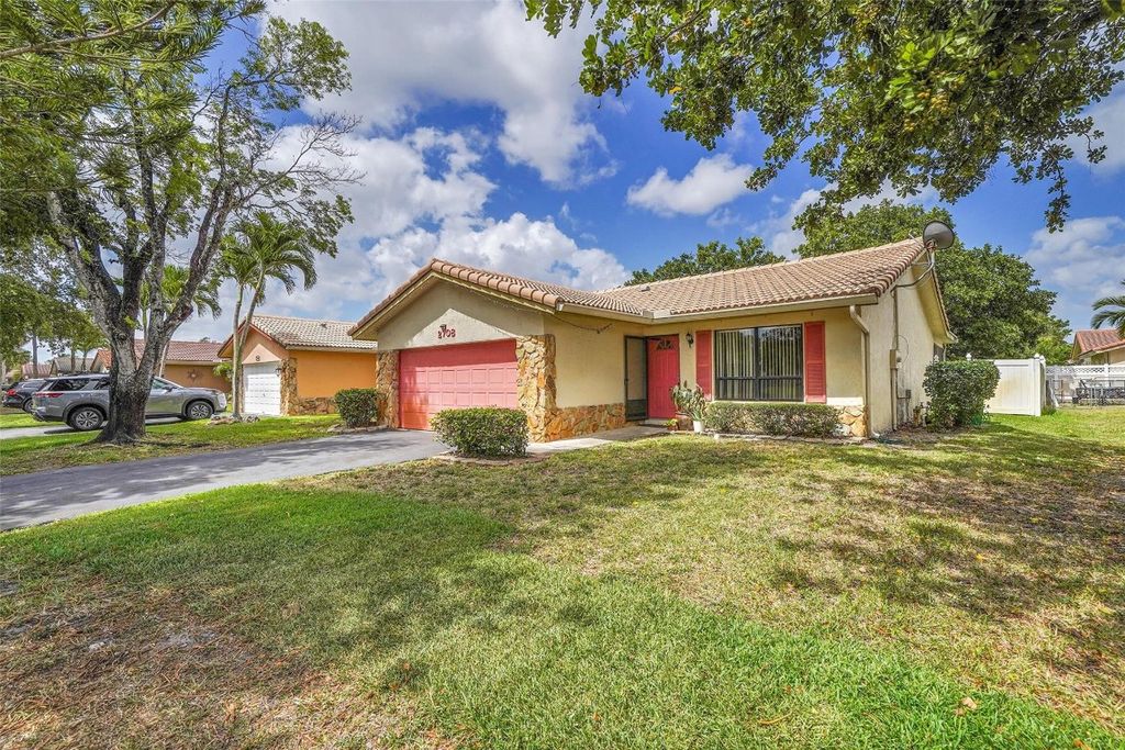 Photo of 2708 NW 91st Avenue, Coral Springs, FL 33065 (MLS # F10500385)