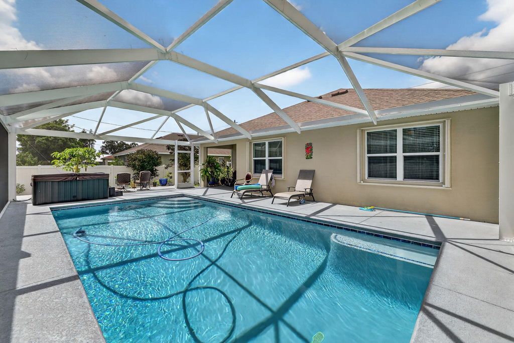 Photo of 2169 SW Savage Boulevard, Port Saint Lucie, FL 34953 (MLS # R11109107)