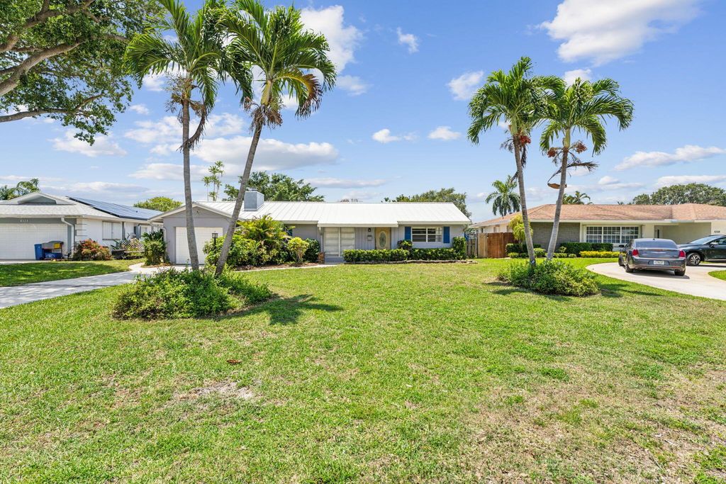 Photo of 4194 Honeysuckle Avenue, Palm Beach Gardens, FL 33410 (MLS # R11144820)