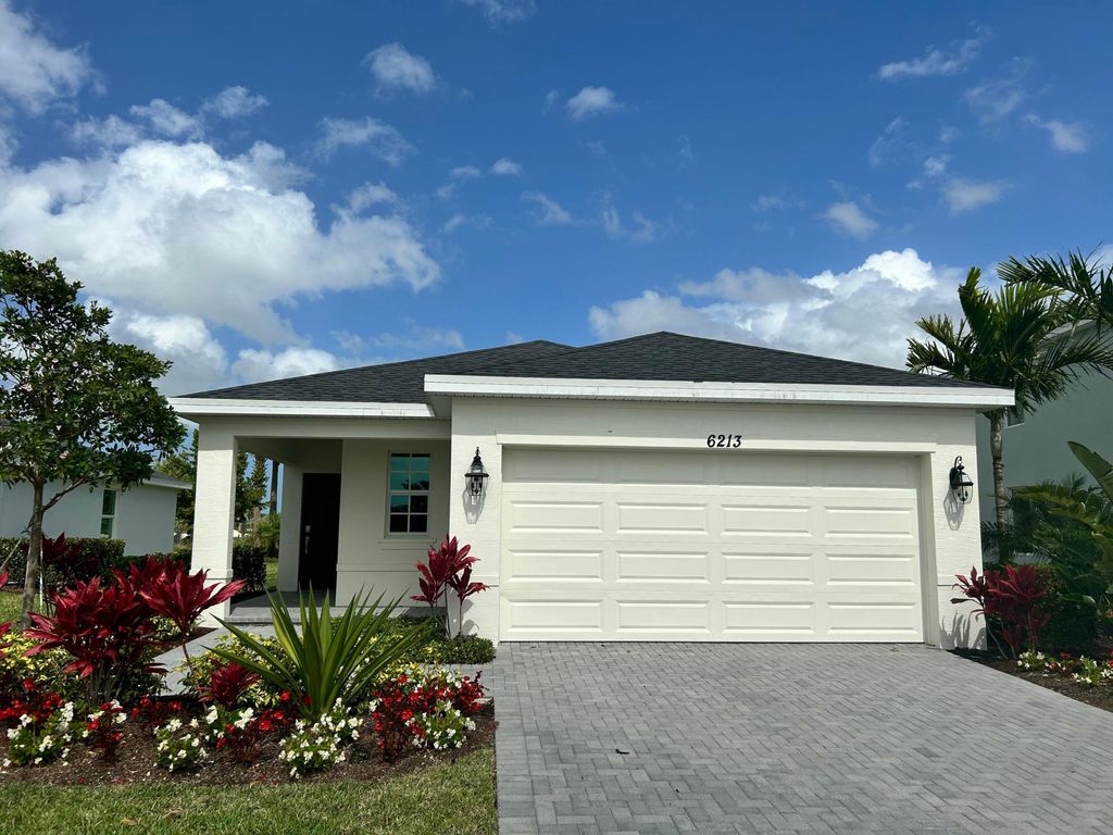 Photo of 6213 NW Sweetwood Drive, Port Saint Lucie, FL 34986 (MLS # R11107880)
