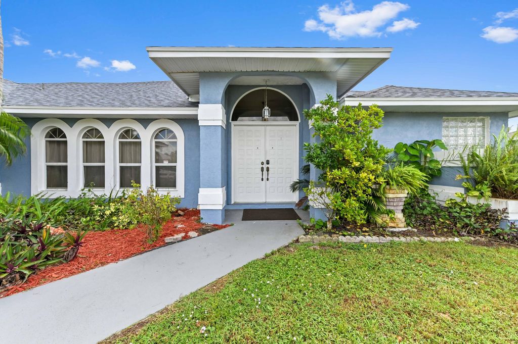 Photo of 1014 SW Canary Terrace, Port Saint Lucie, FL 34953 (MLS # R11136403)