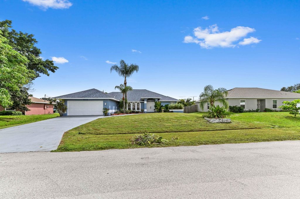 Photo of 1014 SW Canary Terrace, Port Saint Lucie, FL 34953 (MLS # R11136403)
