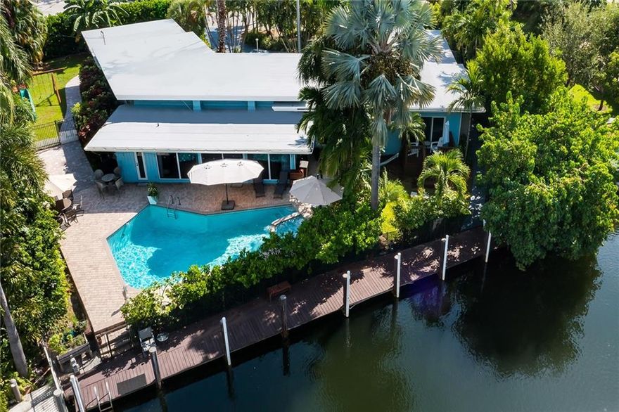 Fort Lauderdale, Harbor Beach neighborhood, waterfront, renovated, spacious 3/4 art deco/modern home. High ceilings. Boaters paradise, protected 90'dock,no fixed bridges, minutes to ocean. Corner lot. Two master bedrooms with double sinks and walk-in  closets each, split 3 bedrooms plan. Spacious kitchen with granite countertops, cooking/eating center island, plenty cabinet space. Very large backyard with huge heated pool/spa. Over sized two car garage. Impact windows & doors. New roof 2020. Optional membership to private beach club, to private marina for additional dock space, to security patrol and  HOA. Gated community.