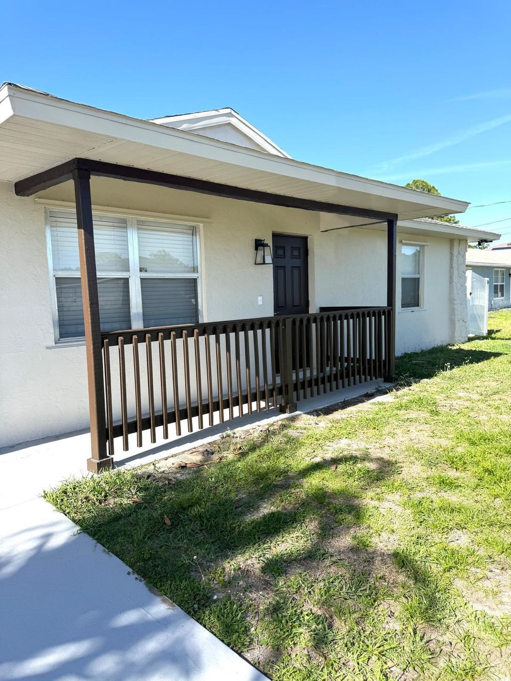 Photo of 699 NW Riverside Drive, Port Saint Lucie, FL 34983 (MLS # B26018516)