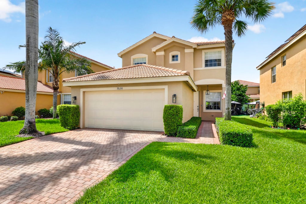 Photo of 7630 Topiary Avenue, Boynton Beach, FL 33437 (MLS # B26058634)