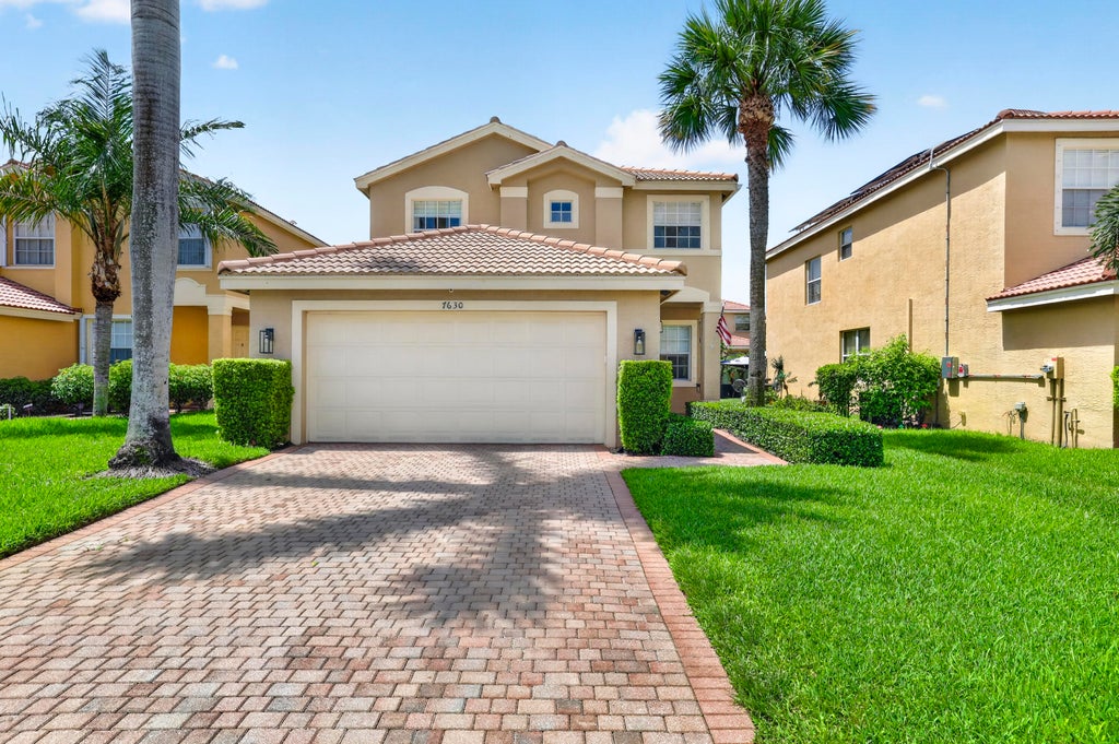 Photo of 7630 Topiary Avenue, Boynton Beach, FL 33437 (MLS # B26058634)