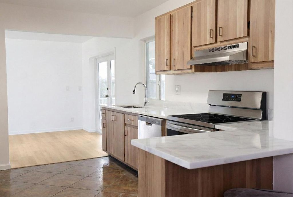 Photo of 1197 E Mountain Drive, West Palm Beach, FL 33406 (MLS # R11153559)