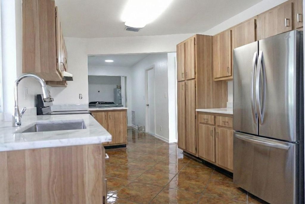 Photo of 1197 E Mountain Drive, West Palm Beach, FL 33406 (MLS # R11153559)