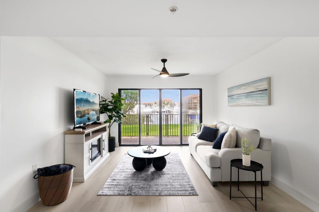 Photo of 1601 Marina Isle Way #101, Jupiter, FL 33477 (MLS # R11114050)