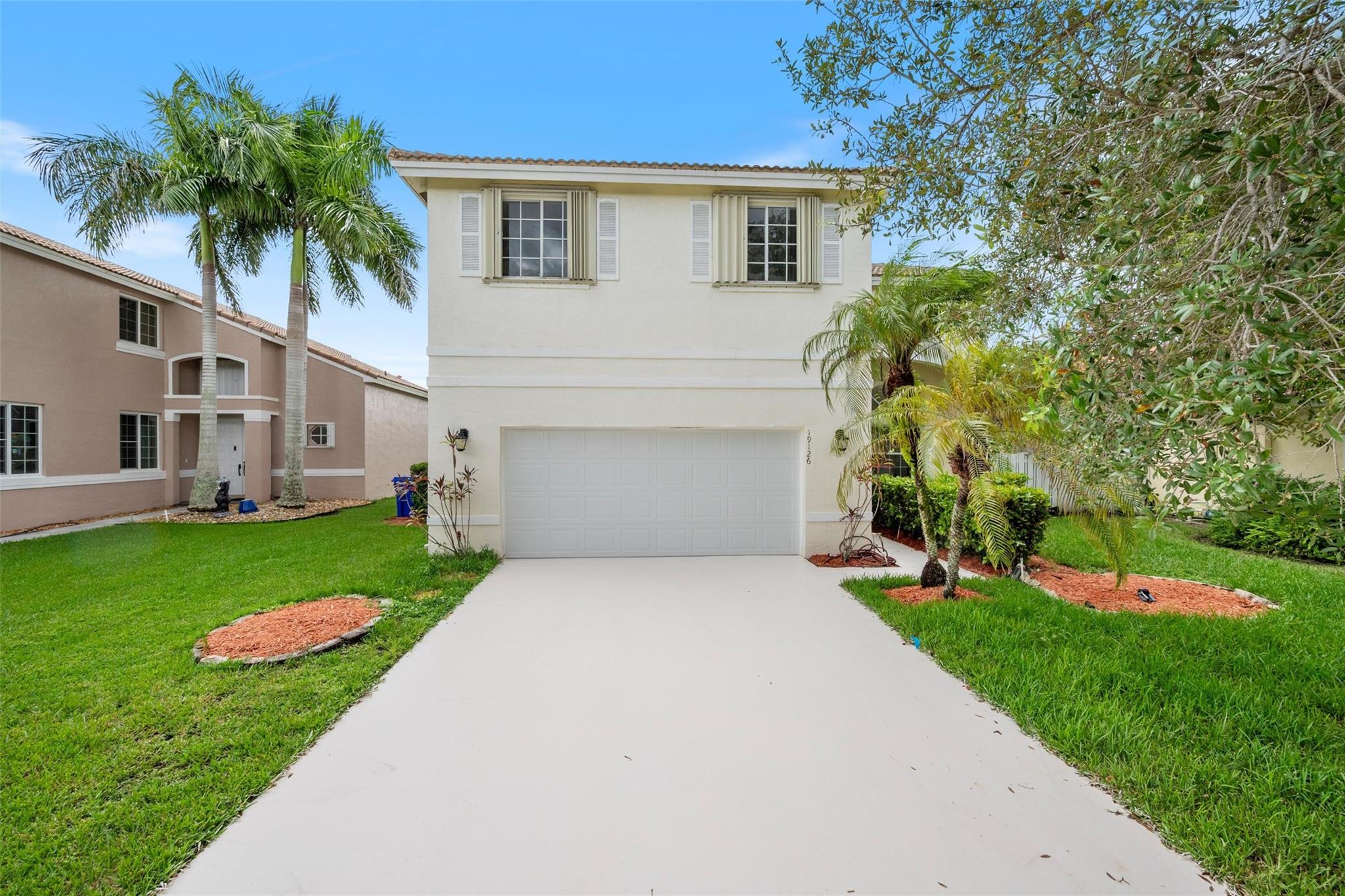 Fully renovated 4BR/2.5BA lakefront home on a preserve lot with long-lake views in guard-gated Estancia, West
Pembroke Pines. 20-ft ceilings in family and dining rooms, plus a separate living room with long-lake views. Kitchen and breakfast nook overlook the water; new kitchen cabinets, counters, island, and faucets. Baths have new vanities, faucets, and mirrors. New interior/exterior paint plus painted driveway and walkway. Designer lighting,crown and column details. Tile first floor, wood upstairs and stairway. Primary suite offers a balcony, Jacuzzi tub,and custom walk-in closet. Oversized 2-car garage with new opener and accordion shutters. Covered patio and fruit trees. 24-hour guard-gated entry, pool, gym, and landscaped sidewalks. Minutes to I-75, Pines Blvd, schools,and dining.