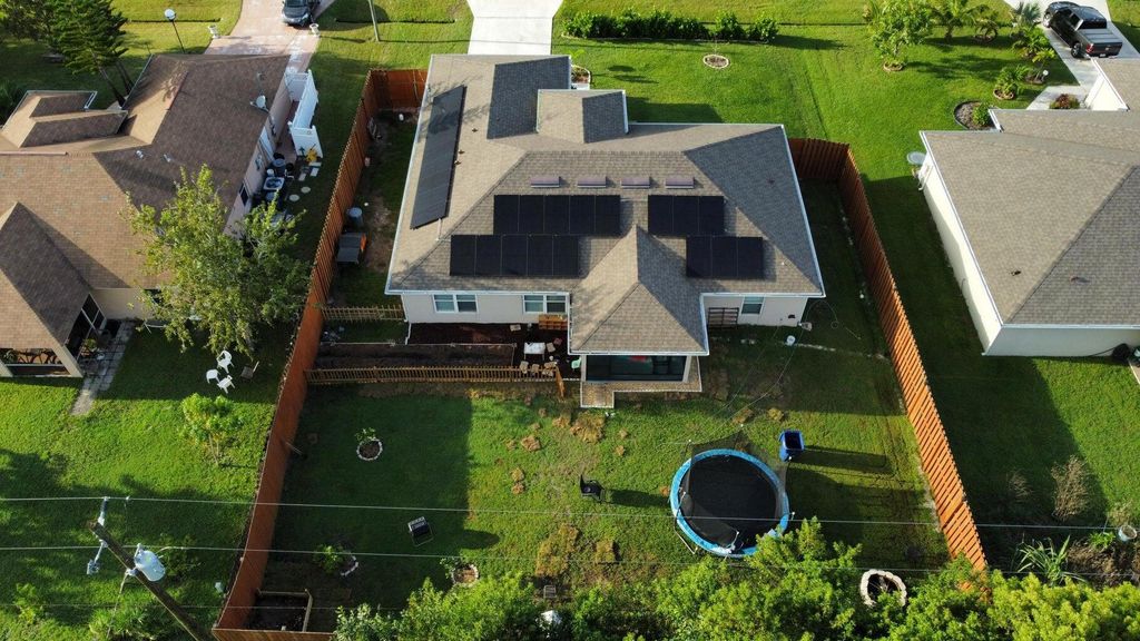 Photo of 150 SW De Gouvea Terrace, Port Saint Lucie, FL 34984 (MLS # R10988103)