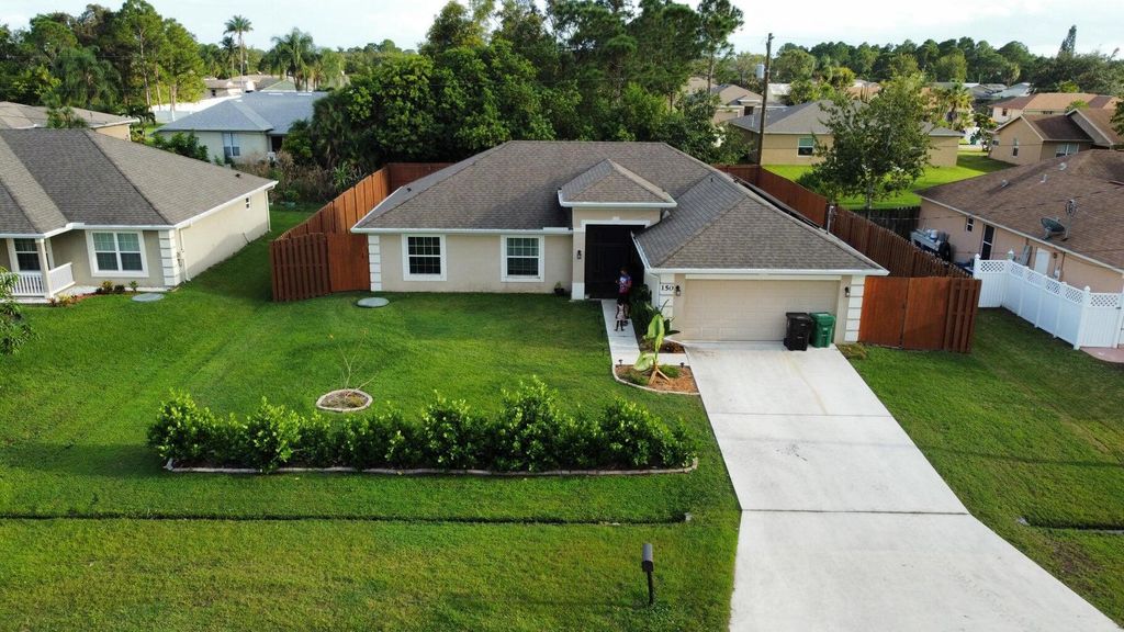 Photo of 150 SW De Gouvea Terrace, Port Saint Lucie, FL 34984 (MLS # R10988103)