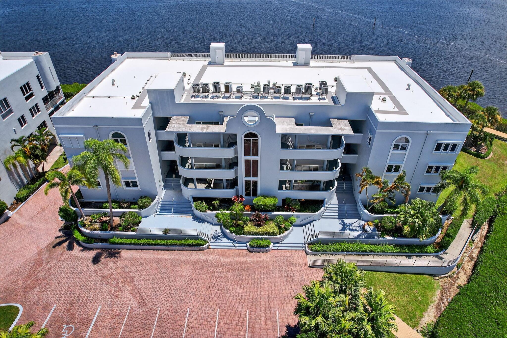 IMAGINE A WIDE WATERFRONT COASTAL CONDO to WAKE UP in EACH DAY! PANORAMIC RIVER VIEWS in this WRAP AROUND CORNER CONDO THAT OVERLOOKS the SAINT LUCIE! YOU'LL LOVE the FAVORABLE WINDS and EAST EXPOSURE making this WONDERFUL 3 BEDROOM 2.5 BATH OPEN CONCEPT RIVERFRONT FEEL MORE LIKE A HOME than a CONDO! WRAPAROUND CORNER HAS VIEWS FROM ALL LIVING AREAS and MASTER SUITE TOO. COMPLETELY REMODELED WITH OPEN CONCEPT KITCHEN, BEAUTIFULLY DONE... GUEST ROOMS, WALK IN PANTRY, UTILITY ROOM & EXTRA STORAGE. THIS ONE of a KIND MARINA COMMUNITY HAS CLUBHOUSE, HEATED POOL, FITNESS CENTER and HAS 40' DOCK AVAILABLE FOR LEASE TO BUYER for COASTAL CRUISING! CALL TODAY!!!